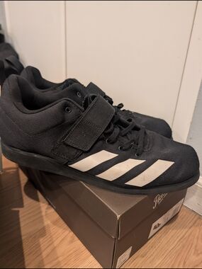 Adidas Black Athletic Shoes with White Stripes